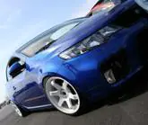 Tuning: Kia Forte Koup Accessories – White Alloy Wheels, Megan Racing Coilovers…