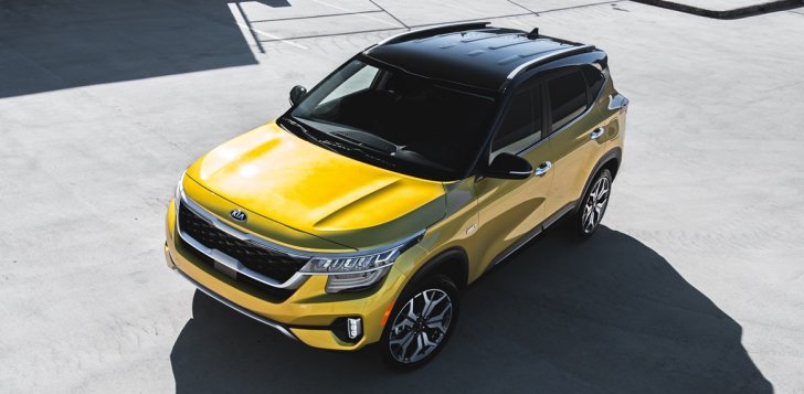 Kia Seltos with yellow body paint and black roof.